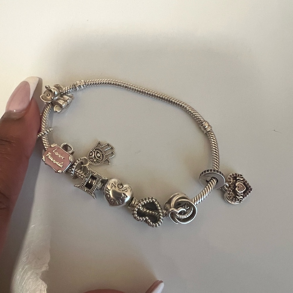 7.5 pandora bracelet with 7 charms